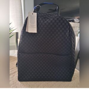 Rothy’s The Backpack in Black Sand